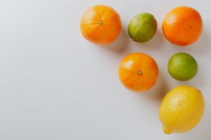 photo of orange beside lemon